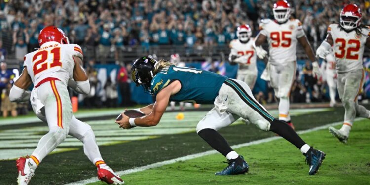 Trevor Lawrence dives for a touchdown during the Jaguars-Chiefs game on Oct. 5, 2025.