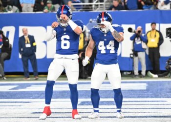 Jaxson Dart (L.) and Cam Skattebo celebrate during the Giants-Eagles game on Oct. 9, 2025.