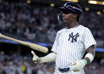 New York Yankees second baseman Jazz Chisholm Jr. (13) reacts after flying out with the bases loaded during the ninth inning of game one of the wild-card round of the 2025 MLB playoffs against the Boston Red Sox at Yankee Stadium.