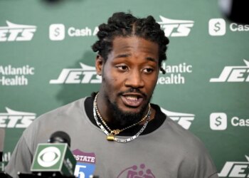 Jets' Jarvis Brownlee talking to the media.