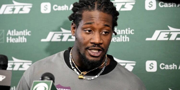 Jets' Jarvis Brownlee talking to the media.