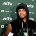 Jets quarterback Justin Fields in a black hoodie speaks to the media. Jets quarterback Justin Fields (7) speaks with the media after practice in Florham Park, NJ.