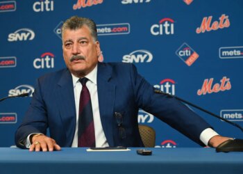 Keith Hernandez speaking at a press conference.