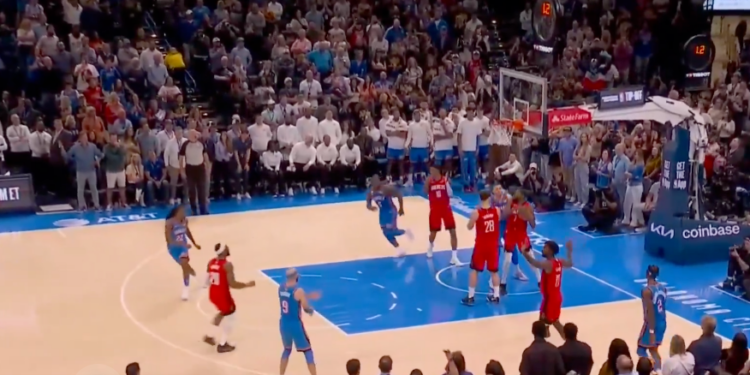 Kevin Durant got the rebound and appeared to signal for a timeout.