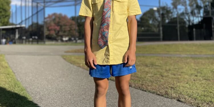 George Kahi, an enthusiastic 14-year-old on Port Washington’s varsity team, who made the New Balance nationals as an eighth grader, is a character on the track who chooses to practice and work out in dress clothes.