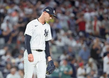 New York Yankees pitcher Luke Weaver reacts after giving up a two-run single.