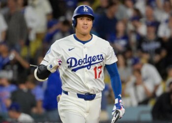 Los Angeles Dodgers designated hitter Shohei Ohtani (17) reacts after flying out against the Cincinnati Reds in the fourth inning during game two of the Wildcard round for the 2025 MLB playoffs at Dodger Stadium.