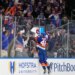 New York Islanders' Matthew Schaefer (48) celebrates his first NHL goal with fans.