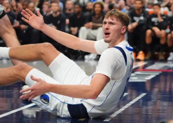 Cooper Flagg reacts in frustration after a non-foul call during the Mavericks' 125-92 blowout home loss to the Spurs on Oct. 22, 2025.