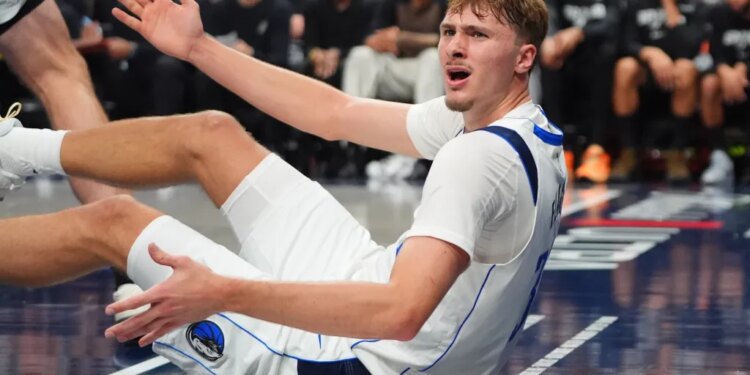 Cooper Flagg reacts in frustration after a non-foul call during the Mavericks' 125-92 blowout home loss to the Spurs on Oct. 22, 2025.