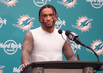 Tua Tagovailoa speaks to the media after the Dolphins-Chargers game on Oct. 12, 2025.
