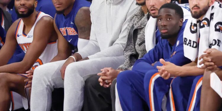 Mitchell Robinson and New York Knicks guard Josh Hart sit on the bench in the first half at Madison Square Garden in New York, Wednesday, October 22, 2025.