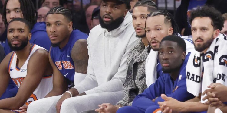 Mitchell Robinson (black cap), who has been managing a balky ankle, could return to action on Friday night against the Bulls.