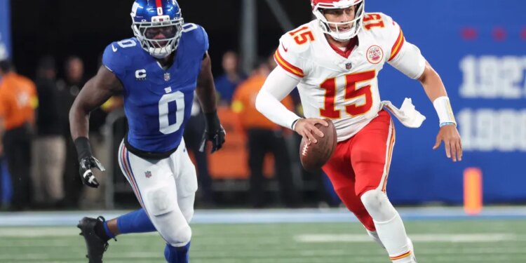 Patrick Mahomes of the Kansas City Chiefs runs out of the pocket.