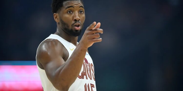 Cleveland Cavaliers guard Donovan Mitchell (45) stands on the court.