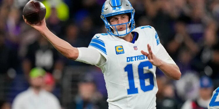 Lions quarterback Jared Goff throwing a pass.