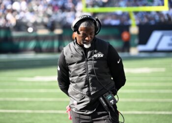 New York Jets coach Robert Saleh on the field.
