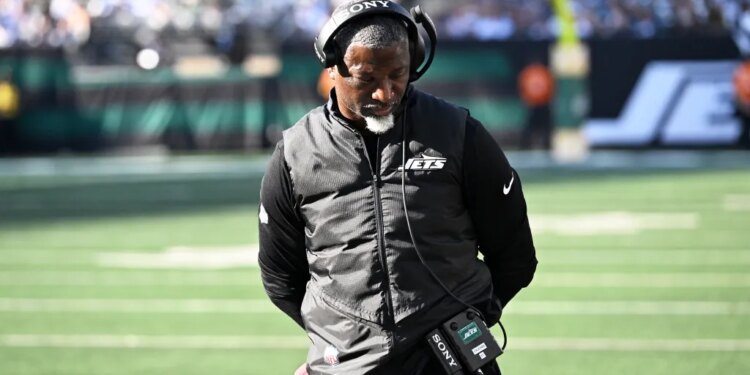 New York Jets coach Robert Saleh on the field.