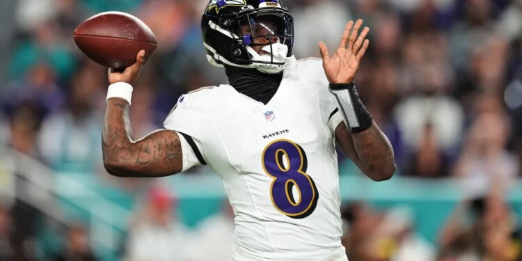 
Baltimore Ravens quarterback Lamar Jackson (8) throws against the Miami Dolphins during the first half of an NFL football game, Thursday, Oct. 30, 2025, in Miami Gardens, Fla.