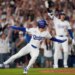 Los Angeles Dodgers' Hyeseong Kim reacts after scoring the game-winning run against the Phillies.