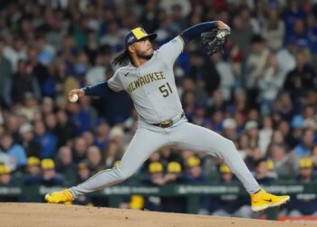 Milwaukee Brewers pitcher Freddy Peralta delivering a pitch.