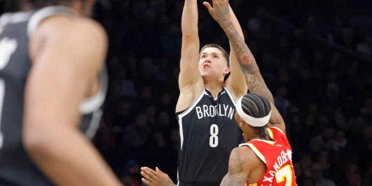 Egor Demin #8 of the Brooklyn Nets puts up a shot over Nickeil Alexander-Walker #7 of the Atlanta Hawks during the first half when the Brooklyn Nets played the Atlanta Hawks Wednesday, October 29, 2025 at Barclays Center in Brooklyn, NY.