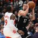 Michael Porter Jr., who scored a game-high 34 point, looks to make a move on RJ Barrett during the Nets' 119-114 loss to the Raptors in their preseason finale on Oct. 17, 2025.