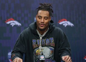 Denver Broncos linebacker Nik Bonitto responds to a question during a news conference after defeating the New York Jets in an NFL football game Sunday, Oct. 12, 2025, in London.