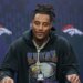 Denver Broncos linebacker Nik Bonitto responds to a question during a news conference after defeating the New York Jets in an NFL football game Sunday, Oct. 12, 2025, in London.