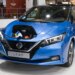 Blue Nissan Leaf e+ Tekna electric car charging at Automobile Barcelona 2021.