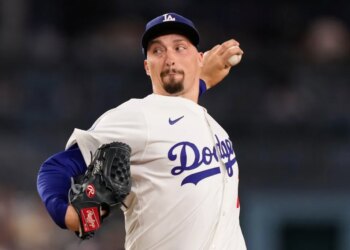 Dodgers pitcher Blake Snell throwing a baseball.