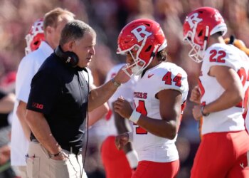 Rutgers head coach Greg Schiano talks with place kicker Jai Patel (44) after he missed a field goal.