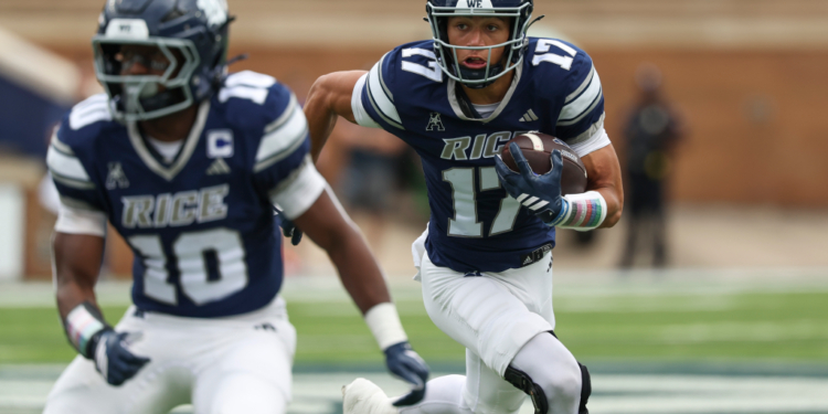 Rice Owls wide receiver Landon Ransom-Goelz (17) runs with the ball during a football game.