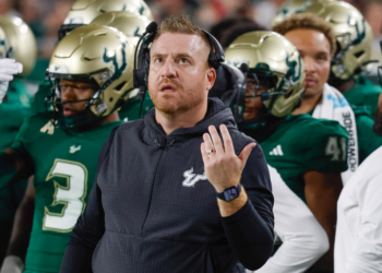 South Florida Bulls head coach Alex Golesh reacting to a replay.
