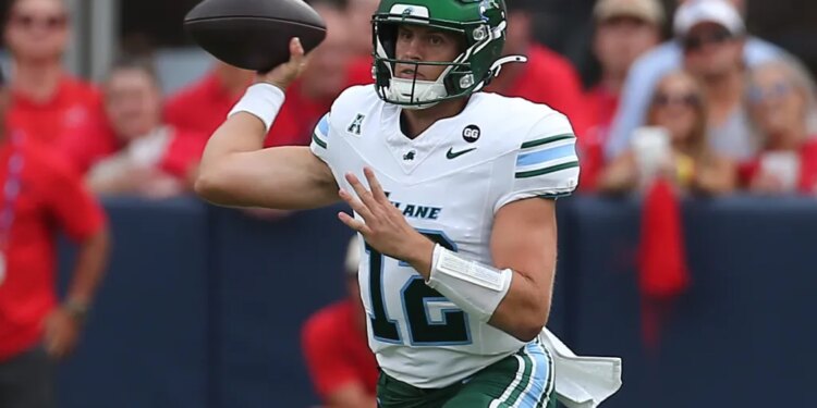 Tulane Green Wave quarterback Jake Retzlaff (12) passes the ball.