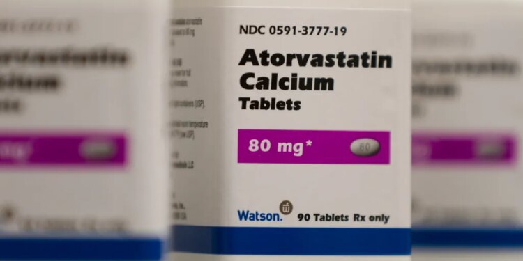 Bottle of Atorvastatin Calcium 80 mg tablets.