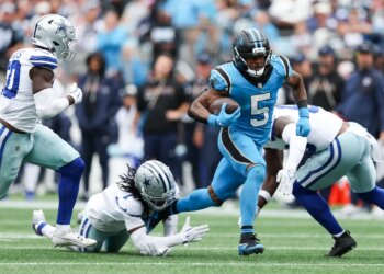 Carolina Panthers running back Rico Dowdle (5) runs with the ball during the second half against the Dallas Cowboys at Bank of America Stadium.