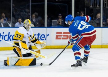 New York Rangers left wing Will Cuylle (50) pressures Pittsburgh Penguins goaltender Arturs Silovs (37) in the first period.