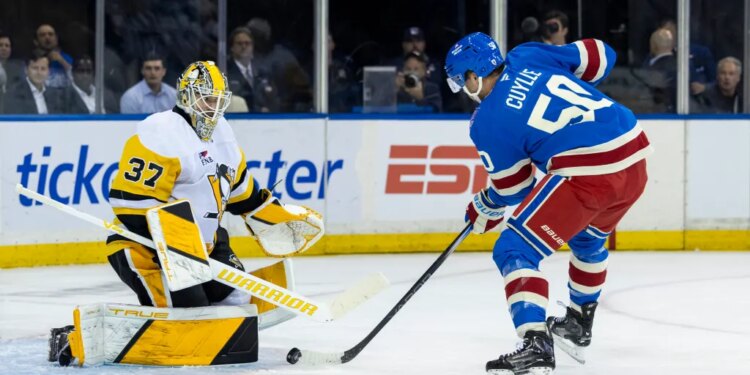 New York Rangers left wing Will Cuylle (50) pressures Pittsburgh Penguins goaltender Arturs Silovs (37) in the first period.