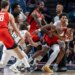 New Orleans Pelicans guard Jose Alvarado (15) and Houston Rockets guard-forward Amen Thompson (1) are pulled apart after a skirmish during an NBA preseason game at Legacy Arena at BJCC.