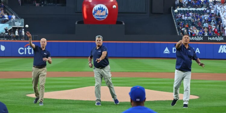 Mets announcers Gary Cohen, Keith Hernandez, and Ron Darling throwing out the ceremonial first pitches.