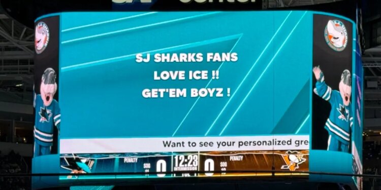 The San Jose Sharks Jumbotron displaying "SJ SHARKS FANS LOVE ICE!! GET'EM BOYZ!"