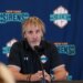 Pascal Daoust, general manager for the New York Sirens, speaks into a microphone at a press conference.