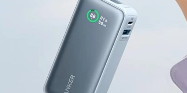 Anker's Nano Power Bank (10K, 2-Ports, Built-in USB-C cable) being held.