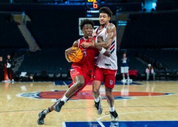 Joson Sanon drives around Dillon Mitchell during a St. John's scrimmage at Madison Square Garden on Oct. 8, 2025.