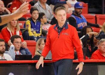 Rick Pitino of the St. John's Red Storm reacts on the sideline during a game against the Towson Tigers.