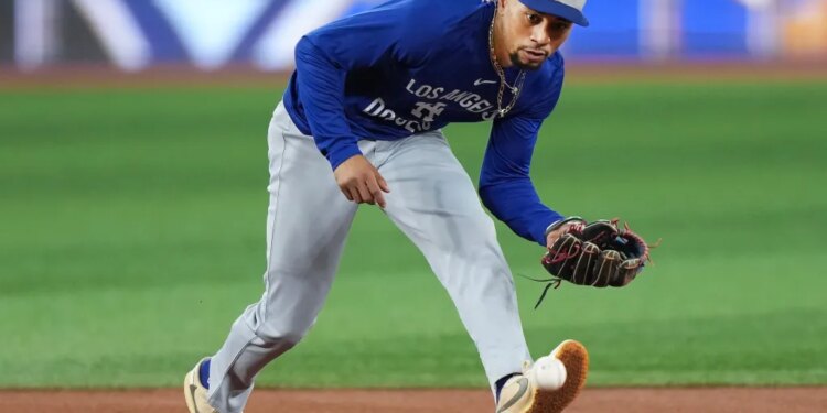 Mookie Betts fields a ground ball during Dodgers practice on Oct. 30, 2025 in preparation for Fridays Game 6 of the World Series against the Blue Jays.