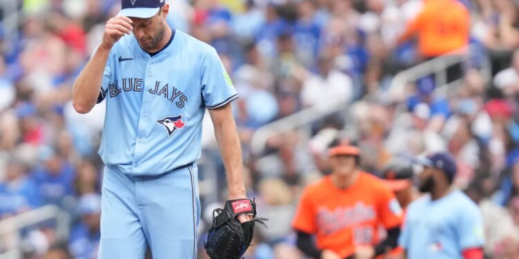 Toronto Blue Jays pitcher Max Scherzer (31) reacting on the mound during the second inning of a baseball game against the Baltimore Orioles.
