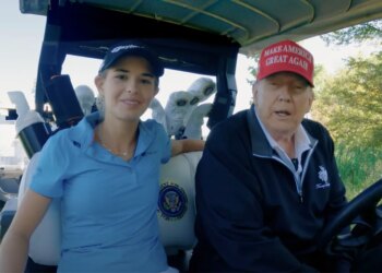 Kai Trump and her grandfather, President Donald Trump playing golf at his course, Trump International, in Washington DC.