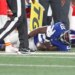 Tyrone Tracy Jr. grabs his shoulder in pain during the Giants-Chiefs game on Sept. 21, 2025.